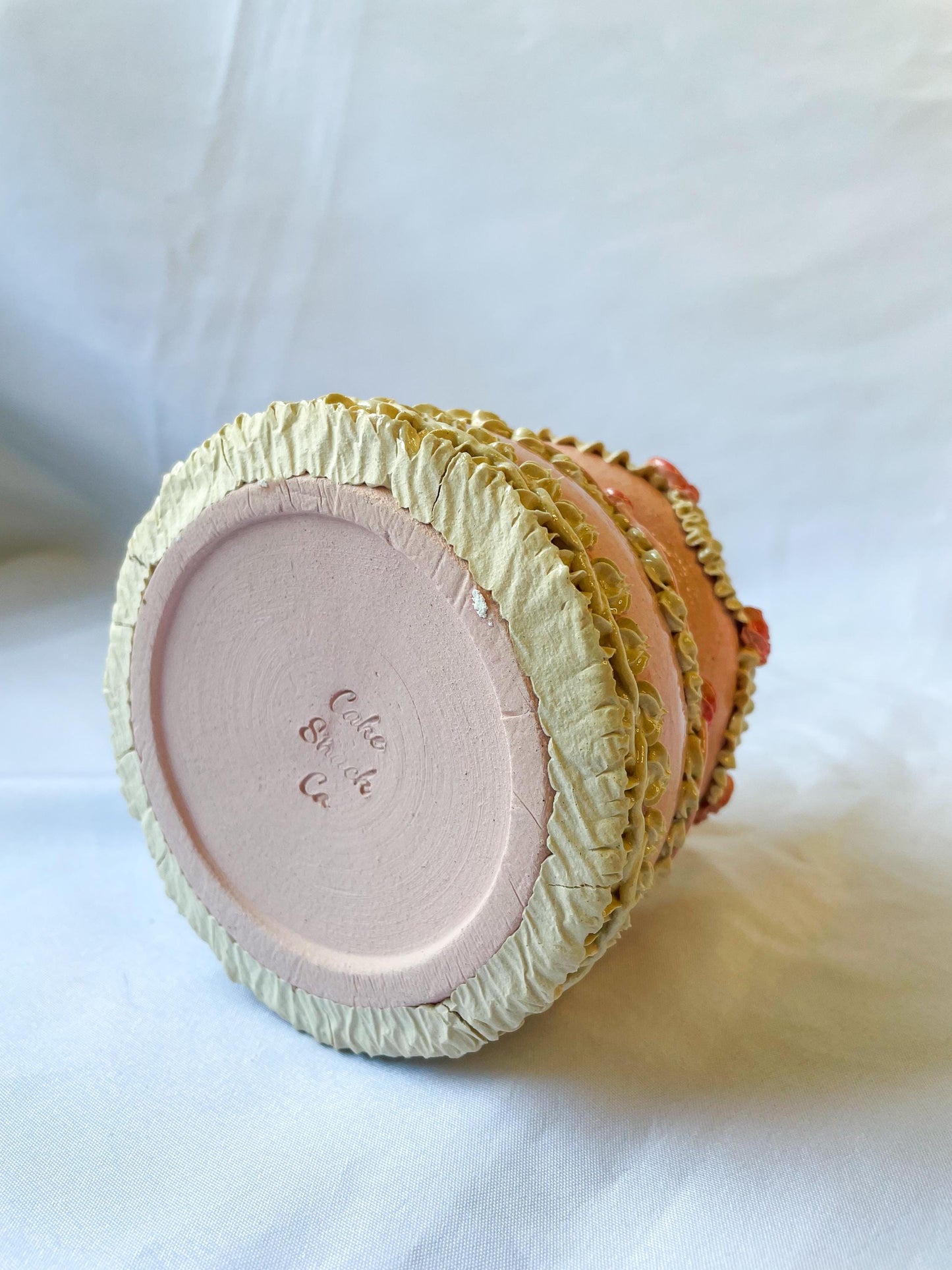 Pink and White Ceramic Cake Vase