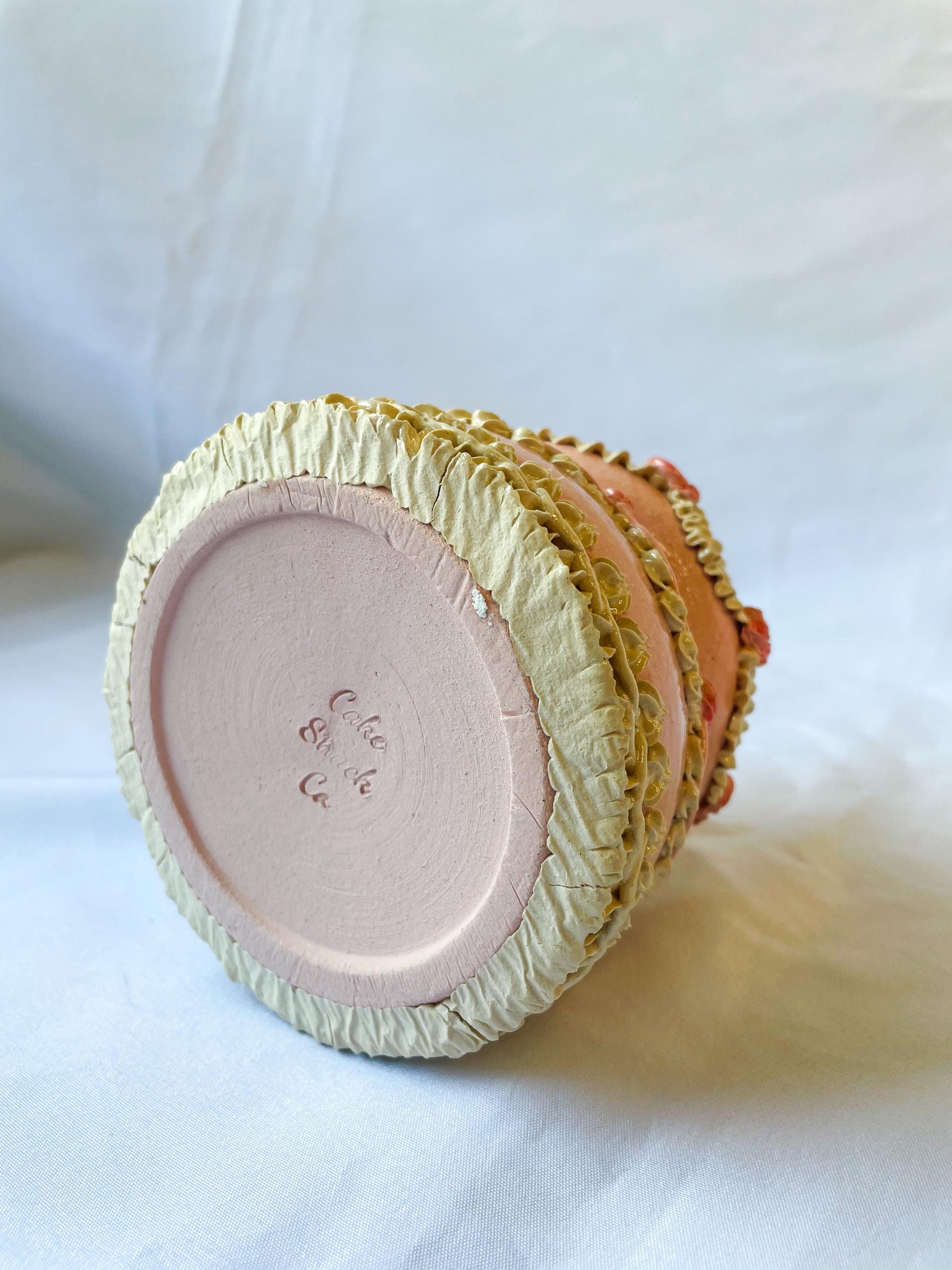 Pink and White Ceramic Cake Vase