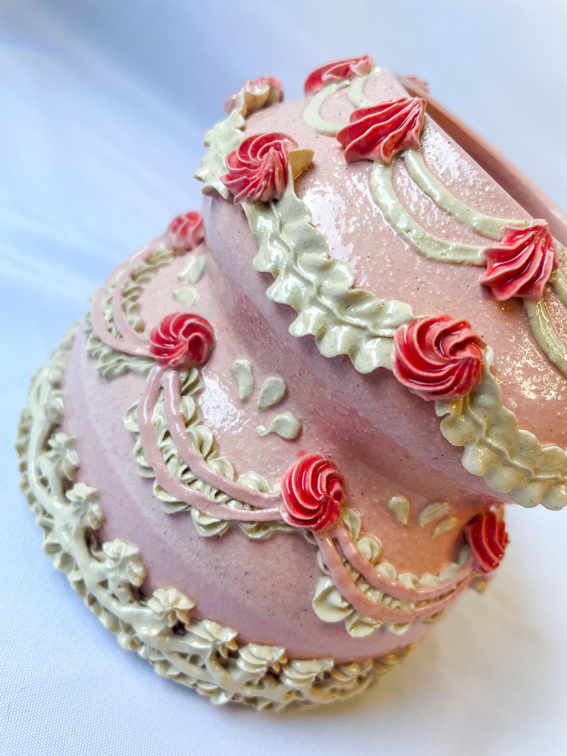 Pink and White Ceramic Cake Vase