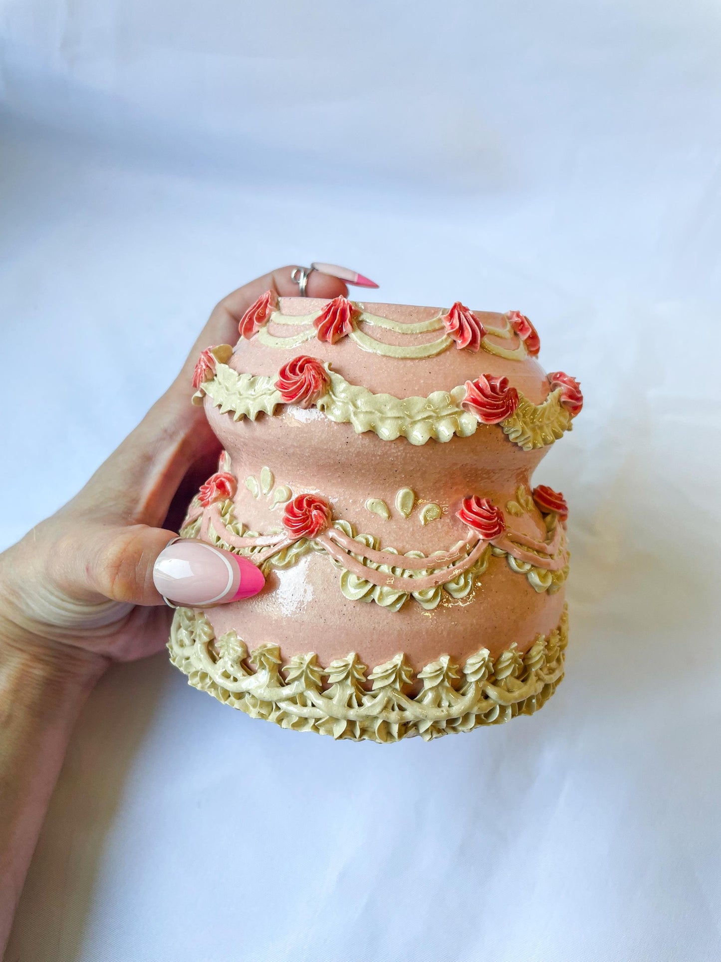 Pink and White Ceramic Cake Vase