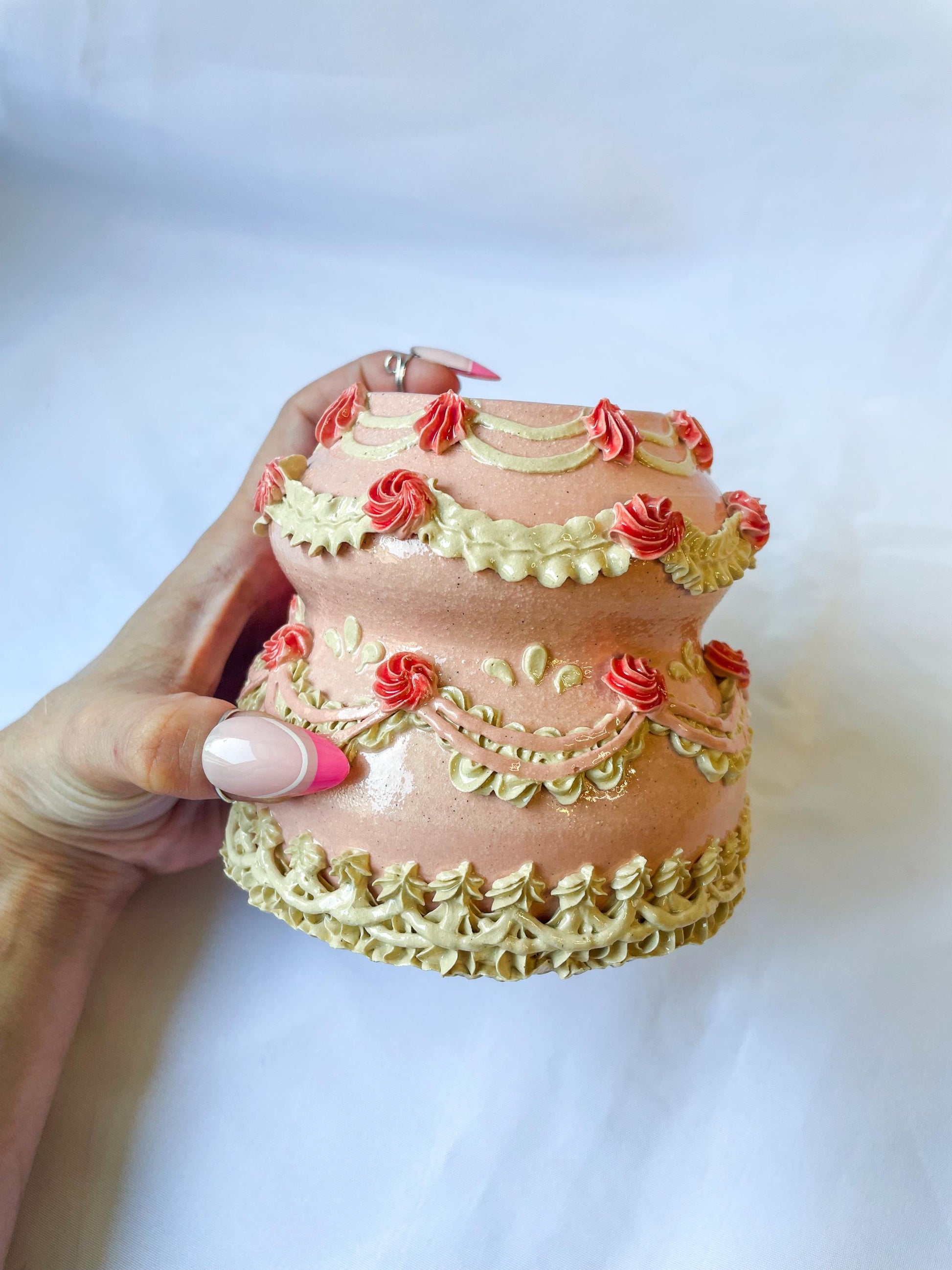 Pink and White Ceramic Cake Vase