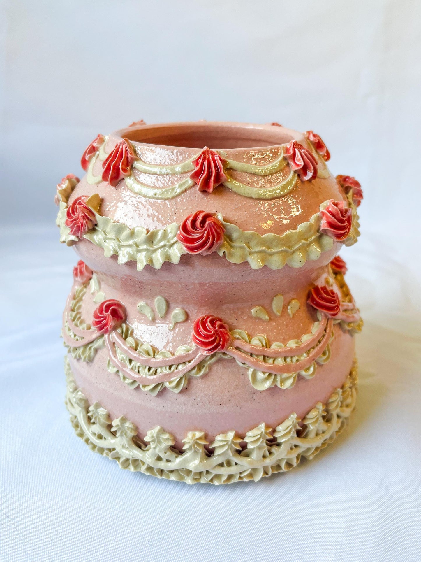 Pink and White Ceramic Cake Vase