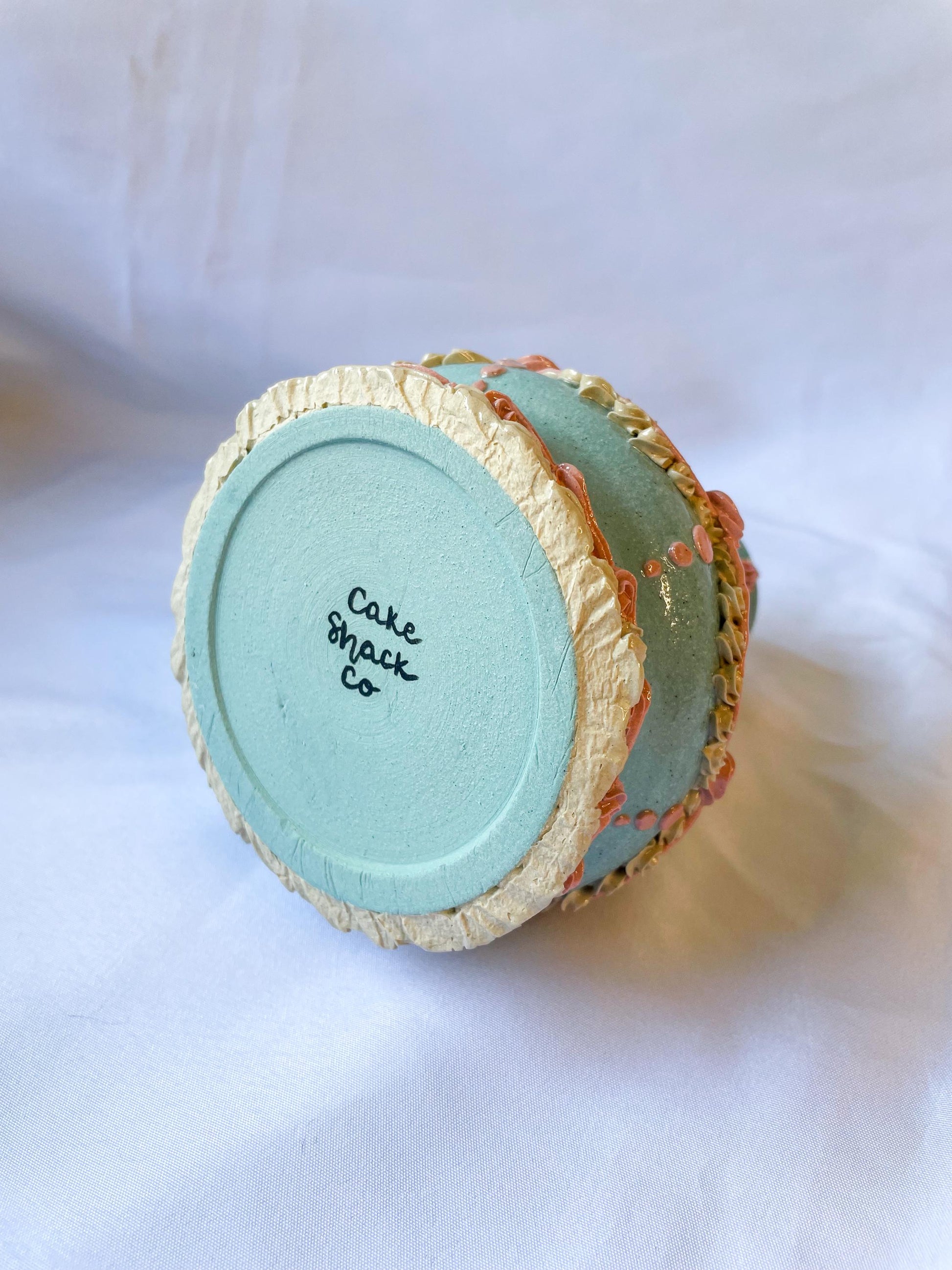 Light Blue and Pink Ceramic Cake Vase