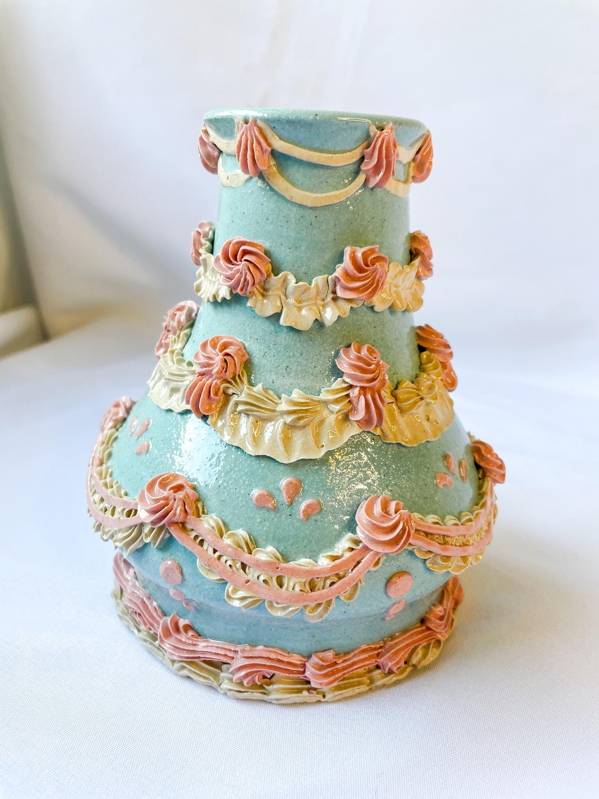 Light Blue and Pink Ceramic Cake Vase