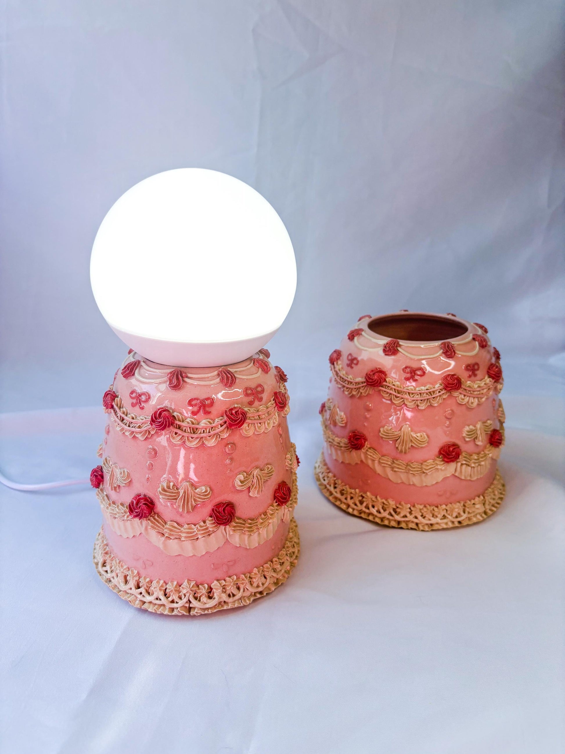 Pink and White Ceramic Cake Table Lamp