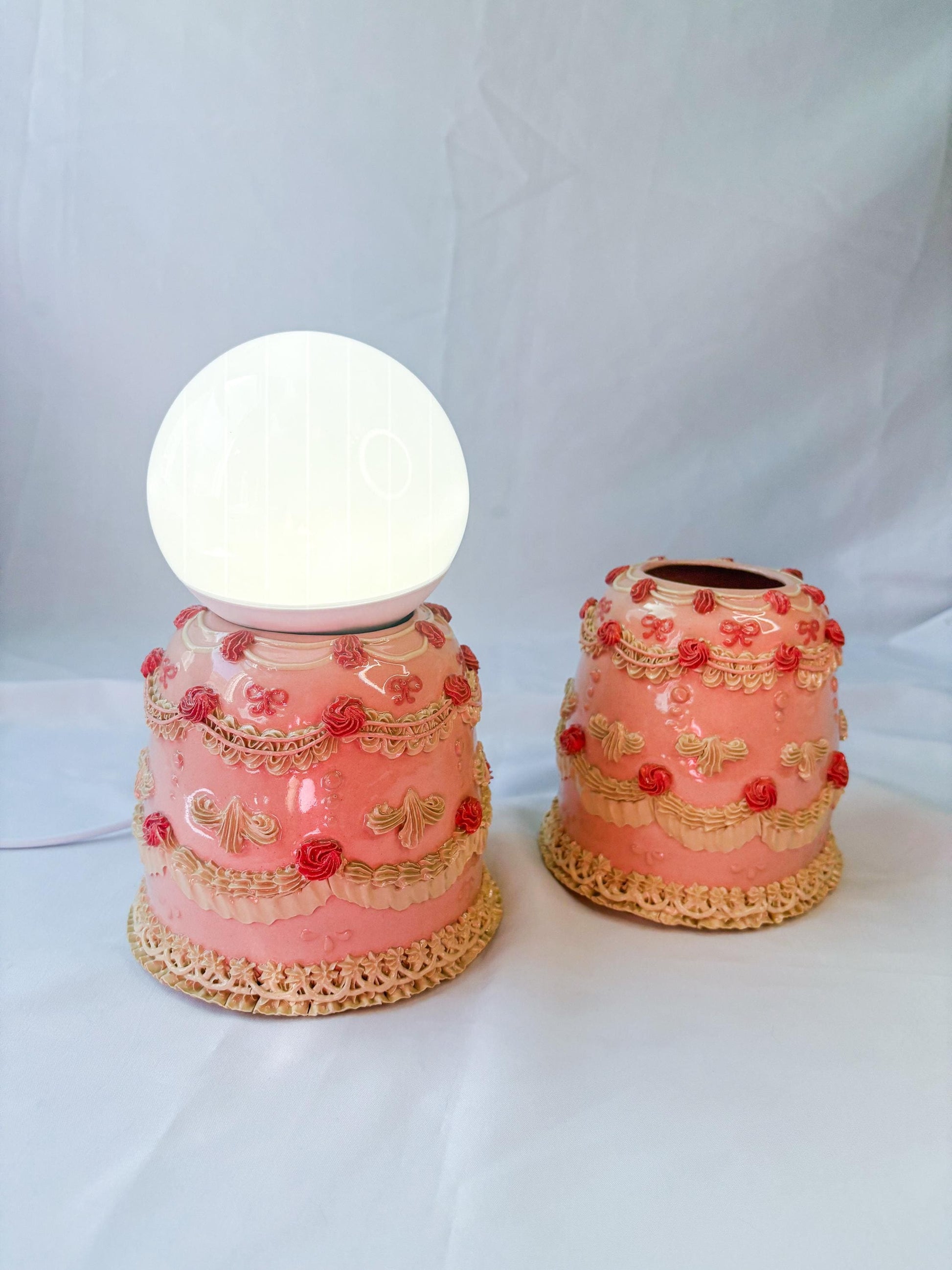 Pink and White Ceramic Cake Table Lamp